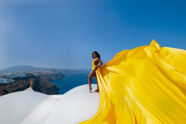 Yellow radiance dress photoshoot in Santorini