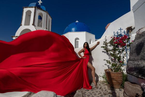 Santorini flying dress photoshoot in red dress